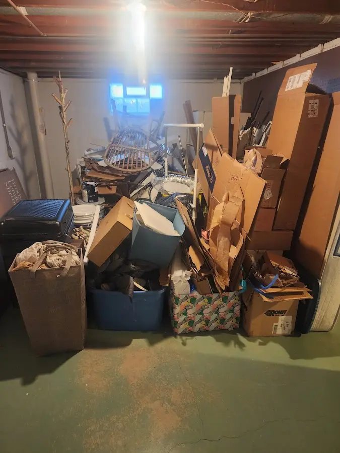 Roll-off dumpster container at job site for 4 Yard Dumpster Rental in Estherville